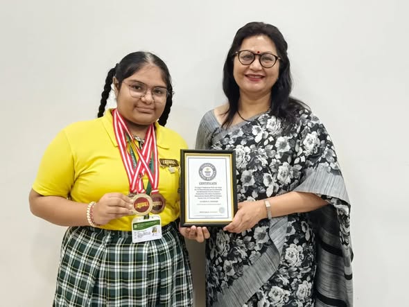 Charmi K Parmar participated in the Guinness World Record for the Largest Simultaneous Hindu Text Recital